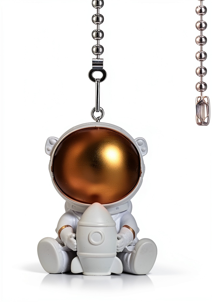 Hyamass gold spaceman rocket ceiling fan pull chain charm displayed against a neutral background